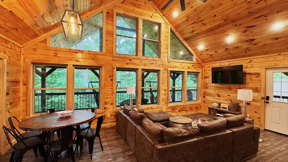 Backroad Beauty — open living room with a wall of windows, Red River Gorge Kentucky cabin